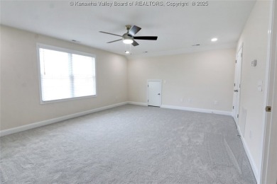 Stunning new construction home with a bright open layout with on Little Creek Country Club in West Virginia - for sale on GolfHomes.com, golf home, golf lot