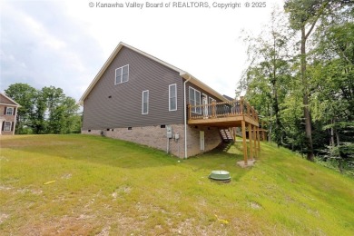 Stunning new construction home with a bright open layout with on Little Creek Country Club in West Virginia - for sale on GolfHomes.com, golf home, golf lot