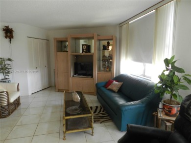 Light, bright, and truly feels like home! This spacious CORNER on Pembroke Lakes Golf Club in Florida - for sale on GolfHomes.com, golf home, golf lot