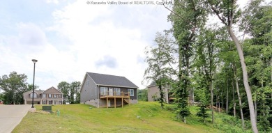 Stunning new construction home with a bright open layout with on Little Creek Country Club in West Virginia - for sale on GolfHomes.com, golf home, golf lot