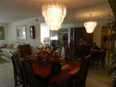 Light, bright, and truly feels like home! This spacious CORNER on Pembroke Lakes Golf Club in Florida - for sale on GolfHomes.com, golf home, golf lot