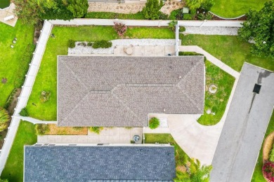 Bond Paid - This conviently located turn-key courtyard villa at on The Links of Spruce Creek in Florida - for sale on GolfHomes.com, golf home, golf lot