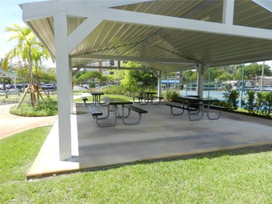 Light, bright, and truly feels like home! This spacious CORNER on Pembroke Lakes Golf Club in Florida - for sale on GolfHomes.com, golf home, golf lot