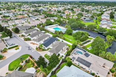 Bond Paid - This conviently located turn-key courtyard villa at on The Links of Spruce Creek in Florida - for sale on GolfHomes.com, golf home, golf lot
