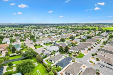 Bond Paid - This conviently located turn-key courtyard villa at on The Links of Spruce Creek in Florida - for sale on GolfHomes.com, golf home, golf lot