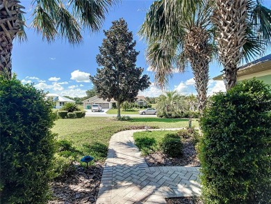 Absolutely gorgeous 3/2 pool home with a bonus room located on LakeSide Country Club in Florida - for sale on GolfHomes.com, golf home, golf lot