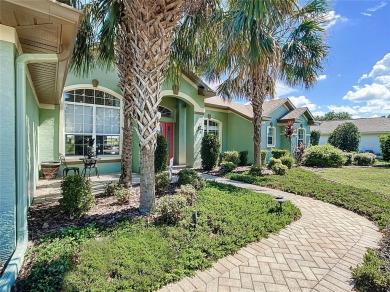 Absolutely gorgeous 3/2 pool home with a bonus room located on LakeSide Country Club in Florida - for sale on GolfHomes.com, golf home, golf lot