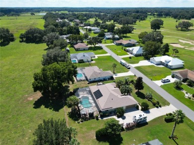 Absolutely gorgeous 3/2 pool home with a bonus room located on LakeSide Country Club in Florida - for sale on GolfHomes.com, golf home, golf lot