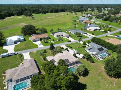 Absolutely gorgeous 3/2 pool home with a bonus room located on LakeSide Country Club in Florida - for sale on GolfHomes.com, golf home, golf lot