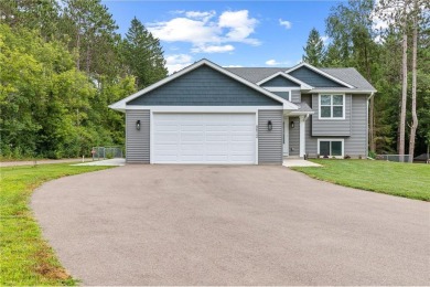 Welcome to this bright and inviting home, featuring an on Spring Valley Golf Course in Wisconsin - for sale on GolfHomes.com, golf home, golf lot
