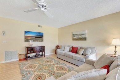Step inside this light & bright condo to find yourself in a on The Links At Boynton Beach - The Family Course in Florida - for sale on GolfHomes.com, golf home, golf lot