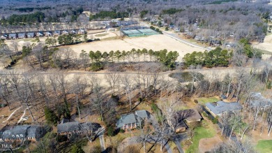 Nestled alongside the picturesque 7th fairway at Forest Oaks on Forest Oaks Country Club in North Carolina - for sale on GolfHomes.com, golf home, golf lot