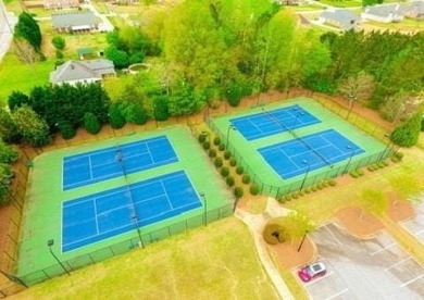Welcome to 2589 Lake Erma Drive, a move-in ready luxury retreat on Crystal Lake Golf and Country Club in Georgia - for sale on GolfHomes.com, golf home, golf lot