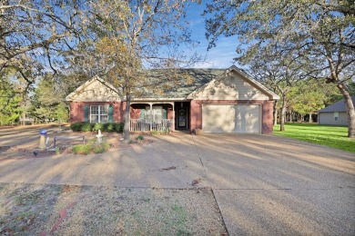 Escape to peaceful living at 7530 Charlya Dr, a cozy 3-bedroom on Lake Athens Partners Community Golf Course in Texas - for sale on GolfHomes.com, golf home, golf lot