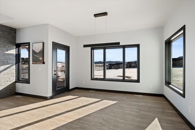Are you ready to live in luxury?  If so, this is the one for on Elkhorn Ridge Golf Course in South Dakota - for sale on GolfHomes.com, golf home, golf lot