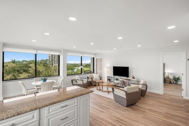 Sunlit Corner Unit with sweeping Golf Course Views in a highly on  in Florida - for sale on GolfHomes.com, golf home, golf lot