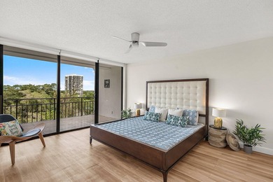 Sunlit Corner Unit with sweeping Golf Course Views in a highly on  in Florida - for sale on GolfHomes.com, golf home, golf lot