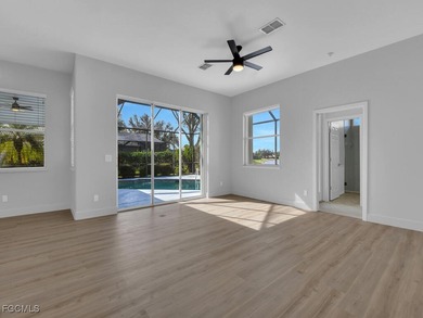 Recently remodeled from top to bottom, this stunning 4-bedroom on Gateway Golf and Country Club in Florida - for sale on GolfHomes.com, golf home, golf lot