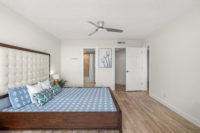 Sunlit Corner Unit with sweeping Golf Course Views in a highly on  in Florida - for sale on GolfHomes.com, golf home, golf lot