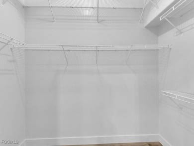 Recently remodeled from top to bottom, this stunning 4-bedroom on Gateway Golf and Country Club in Florida - for sale on GolfHomes.com, golf home, golf lot