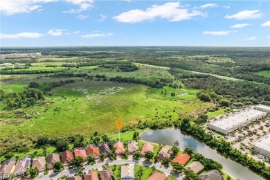 Privacy and tranquility define this breathtaking, must-see pool on Gateway Golf and Country Club in Florida - for sale on GolfHomes.com, golf home, golf lot