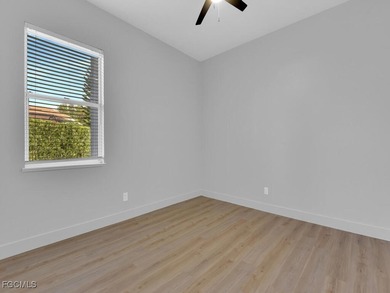 Recently remodeled from top to bottom, this stunning 4-bedroom on Gateway Golf and Country Club in Florida - for sale on GolfHomes.com, golf home, golf lot