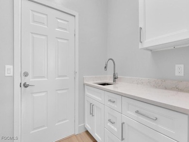 Recently remodeled from top to bottom, this stunning 4-bedroom on Gateway Golf and Country Club in Florida - for sale on GolfHomes.com, golf home, golf lot