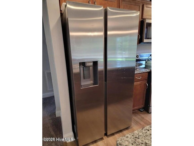 Custom home on huge lot with NO HOA and water view of Paradise on The Lakes Country Club in North Carolina - for sale on GolfHomes.com, golf home, golf lot