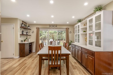 Beautifully updated Woodmist model in the desirable gated on Spring Lake Golf Club - Thunderbird in New York - for sale on GolfHomes.com, golf home, golf lot