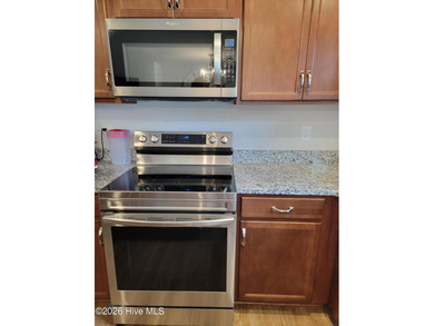 Custom home on huge lot with NO HOA and water view of Paradise on The Lakes Country Club in North Carolina - for sale on GolfHomes.com, golf home, golf lot