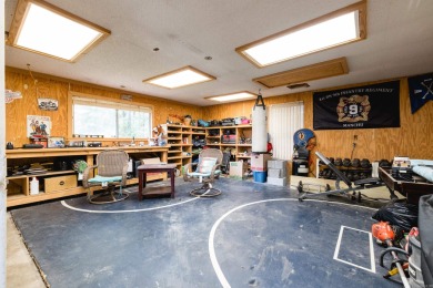 This mid-century, single-level home sits on a spacious half acre on Maumelle Golf and Country Club in Arkansas - for sale on GolfHomes.com, golf home, golf lot