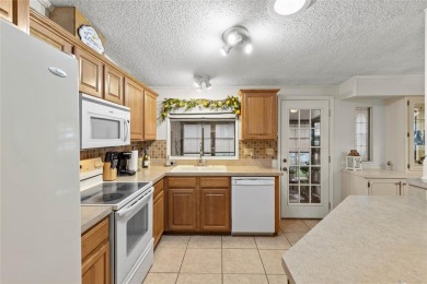 This one is truly a MUST-SEE!!! Welcome to this charming on Orange Blossom Hills Golf and Country Club in Florida - for sale on GolfHomes.com, golf home, golf lot