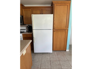 ENJOY PEACEFUL WATERFRONT LIVING IN THIS BRIGHT AND SPACIOUS on Schalamar Creek Golf and Country Club in Florida - for sale on GolfHomes.com, golf home, golf lot