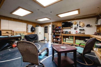 This mid-century, single-level home sits on a spacious half acre on Maumelle Golf and Country Club in Arkansas - for sale on GolfHomes.com, golf home, golf lot