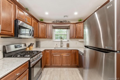 Beautifully updated Woodmist model in the desirable gated on Spring Lake Golf Club - Thunderbird in New York - for sale on GolfHomes.com, golf home, golf lot