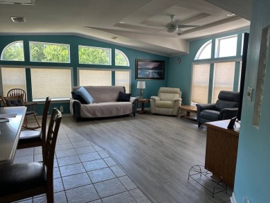 ENJOY PEACEFUL WATERFRONT LIVING IN THIS BRIGHT AND SPACIOUS on Schalamar Creek Golf and Country Club in Florida - for sale on GolfHomes.com, golf home, golf lot