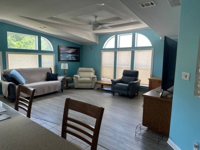 ENJOY PEACEFUL WATERFRONT LIVING IN THIS BRIGHT AND SPACIOUS on Schalamar Creek Golf and Country Club in Florida - for sale on GolfHomes.com, golf home, golf lot