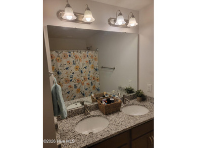 Custom home on huge lot with NO HOA and water view of Paradise on The Lakes Country Club in North Carolina - for sale on GolfHomes.com, golf home, golf lot