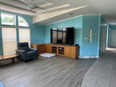 ENJOY PEACEFUL WATERFRONT LIVING IN THIS BRIGHT AND SPACIOUS on Schalamar Creek Golf and Country Club in Florida - for sale on GolfHomes.com, golf home, golf lot