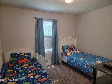 Custom home on huge lot with NO HOA and water view of Paradise on The Lakes Country Club in North Carolina - for sale on GolfHomes.com, golf home, golf lot