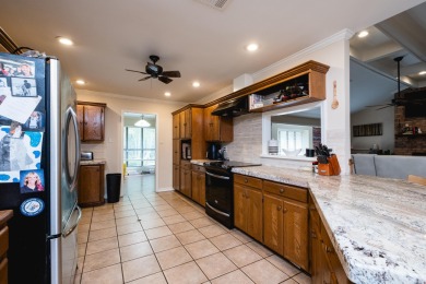 This mid-century, single-level home sits on a spacious half acre on Maumelle Golf and Country Club in Arkansas - for sale on GolfHomes.com, golf home, golf lot