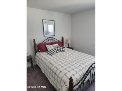 Custom home on huge lot with NO HOA and water view of Paradise on The Lakes Country Club in North Carolina - for sale on GolfHomes.com, golf home, golf lot