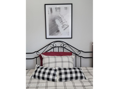 Custom home on huge lot with NO HOA and water view of Paradise on The Lakes Country Club in North Carolina - for sale on GolfHomes.com, golf home, golf lot