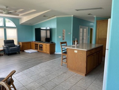 ENJOY PEACEFUL WATERFRONT LIVING IN THIS BRIGHT AND SPACIOUS on Schalamar Creek Golf and Country Club in Florida - for sale on GolfHomes.com, golf home, golf lot