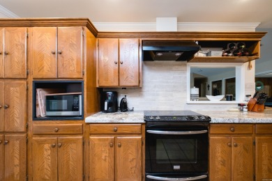 This mid-century, single-level home sits on a spacious half acre on Maumelle Golf and Country Club in Arkansas - for sale on GolfHomes.com, golf home, golf lot