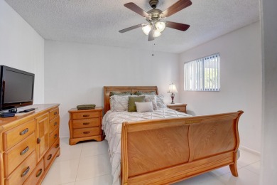 Beautiful, immaculate first floor corner unit, large open on Indian Spring Golf and Country Club in Florida - for sale on GolfHomes.com, golf home, golf lot