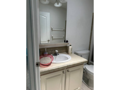 ENJOY PEACEFUL WATERFRONT LIVING IN THIS BRIGHT AND SPACIOUS on Schalamar Creek Golf and Country Club in Florida - for sale on GolfHomes.com, golf home, golf lot