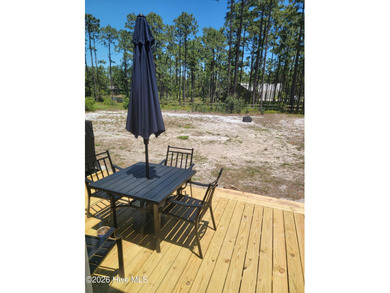 Custom home on huge lot with NO HOA and water view of Paradise on The Lakes Country Club in North Carolina - for sale on GolfHomes.com, golf home, golf lot