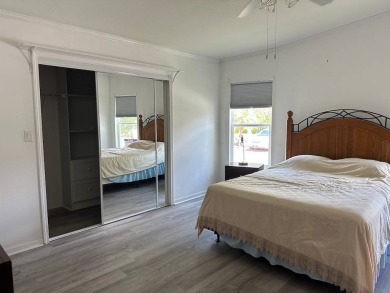 ENJOY PEACEFUL WATERFRONT LIVING IN THIS BRIGHT AND SPACIOUS on Schalamar Creek Golf and Country Club in Florida - for sale on GolfHomes.com, golf home, golf lot
