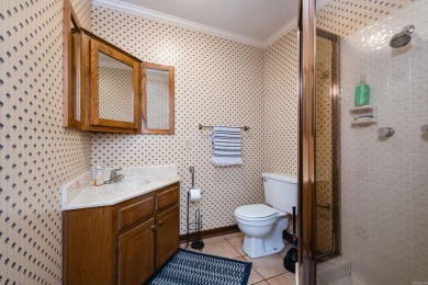 This mid-century, single-level home sits on a spacious half acre on Maumelle Golf and Country Club in Arkansas - for sale on GolfHomes.com, golf home, golf lot